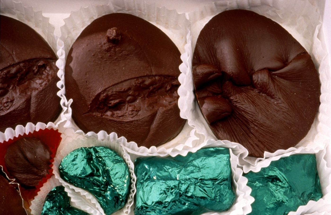 UNIDENTIFIED. RUSSIAN MORGUE CHOCOLATES_______impressions from wounds cast in dark chocolate / 44 X 48X 8 cm / 1994