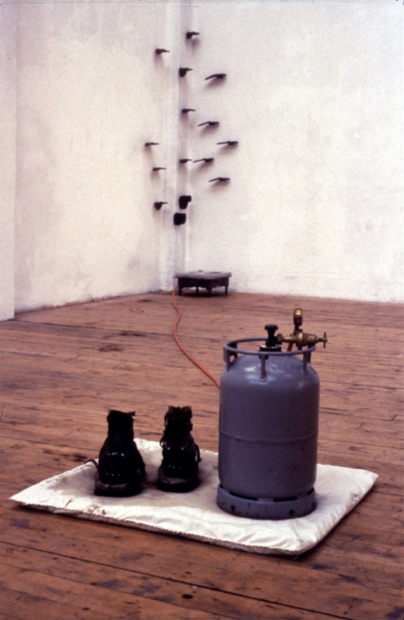 LANDSCAPE WITH INCIDENT_______bronze soled shoes heated to flash point / Oceaan Gallery Arnhem The Netherlands / 1993