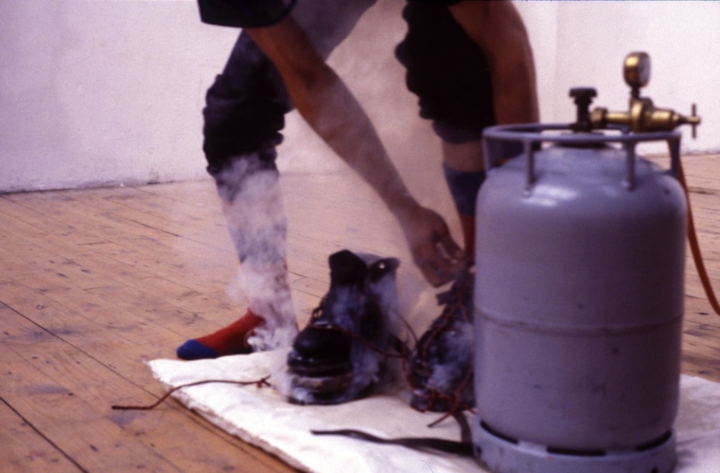 LANDSCAPE WITH INCIDENT_______bronze soled shoes heated to flash point / Oceaan Gallery Arnhem The Netherlands / 1993