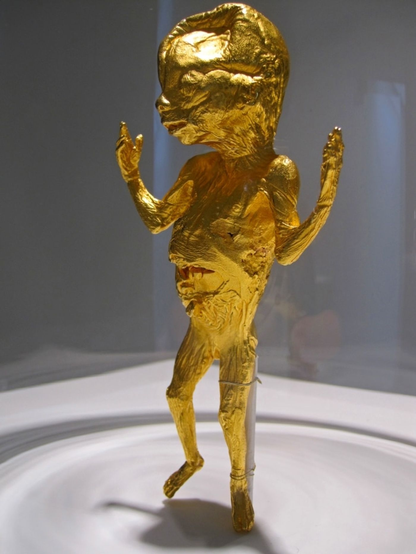 IF JESUS HAD BEEN AN ABORTION HOW HAPPY WE WOULD BE_______15 x 7 x 4 cm, 24 karat gold plated cast bronze / 2009 / Edition of 3 + 1 AP