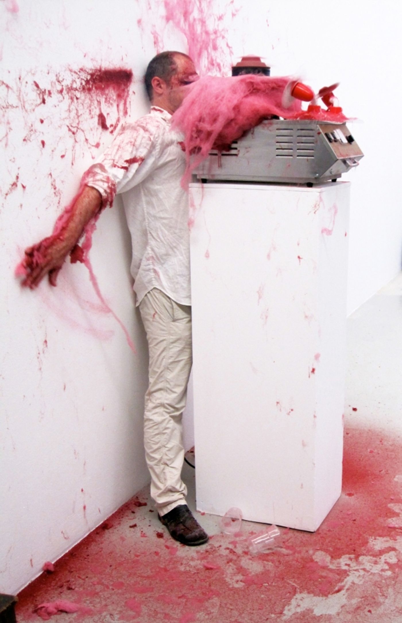 SLAPPED IN THE FACE TILL YOUR SHIT TURNS RED_______performance, cotton candy machine/ 2009 / CAN, Centre d'Art Neuchâtel, Switzerland