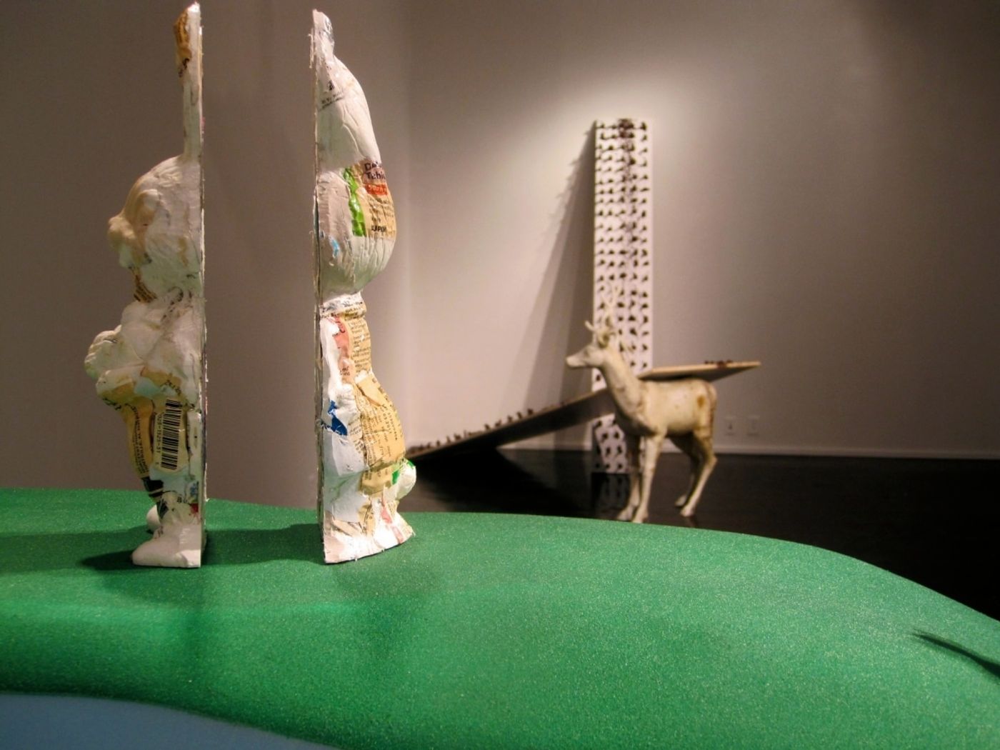 HOPPING HILLS, THE PHARMACEUTICAL LANDSCAPE_______pill bottles melt into the form of Easter Bunnies, wood, foam / 250X 300X 150 cm / 2009