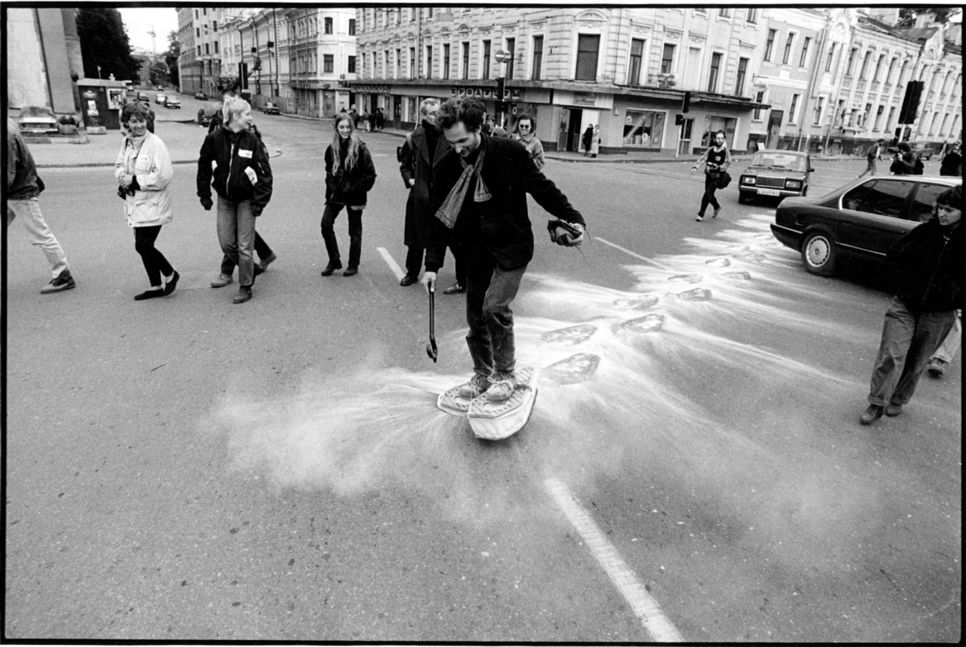 SNOWSHOES_______an ongoing performance, snowshoes containing white flour are leaving marks while walking in different cities / MOSCOW / 1993 —