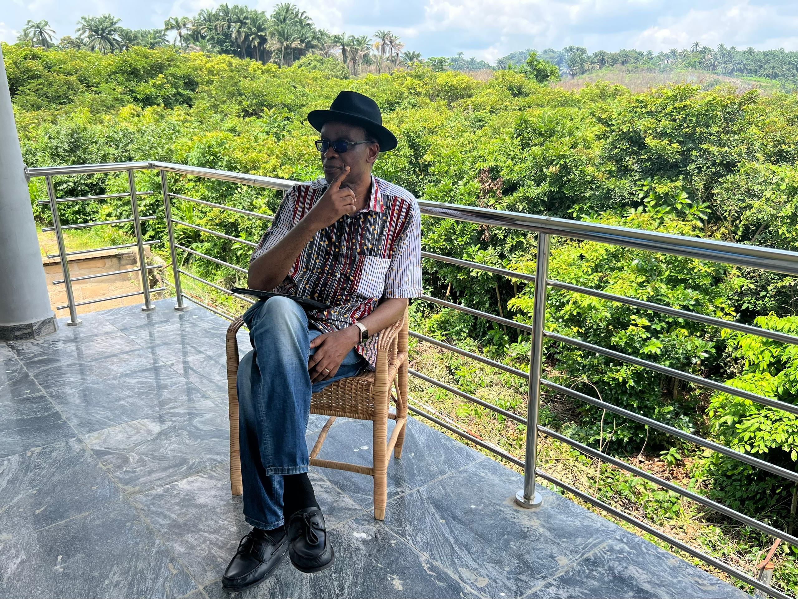 Sitting on the balcony over the valley