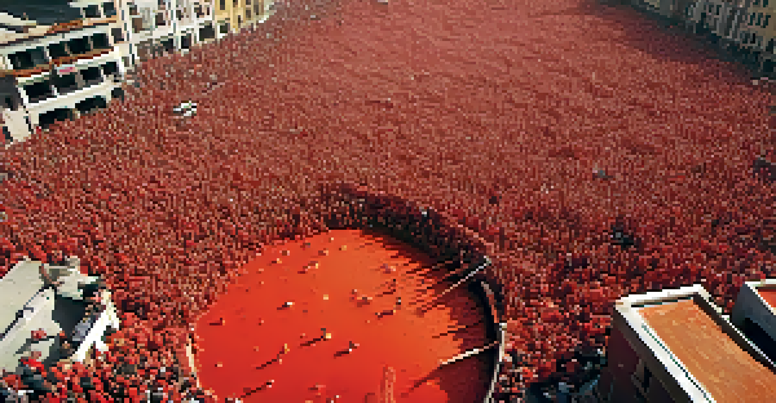 Aerial view of the aftermath of La Tomatina, showcasing tomato-covered streets and participants cleaning up in a vibrant community atmosphere.