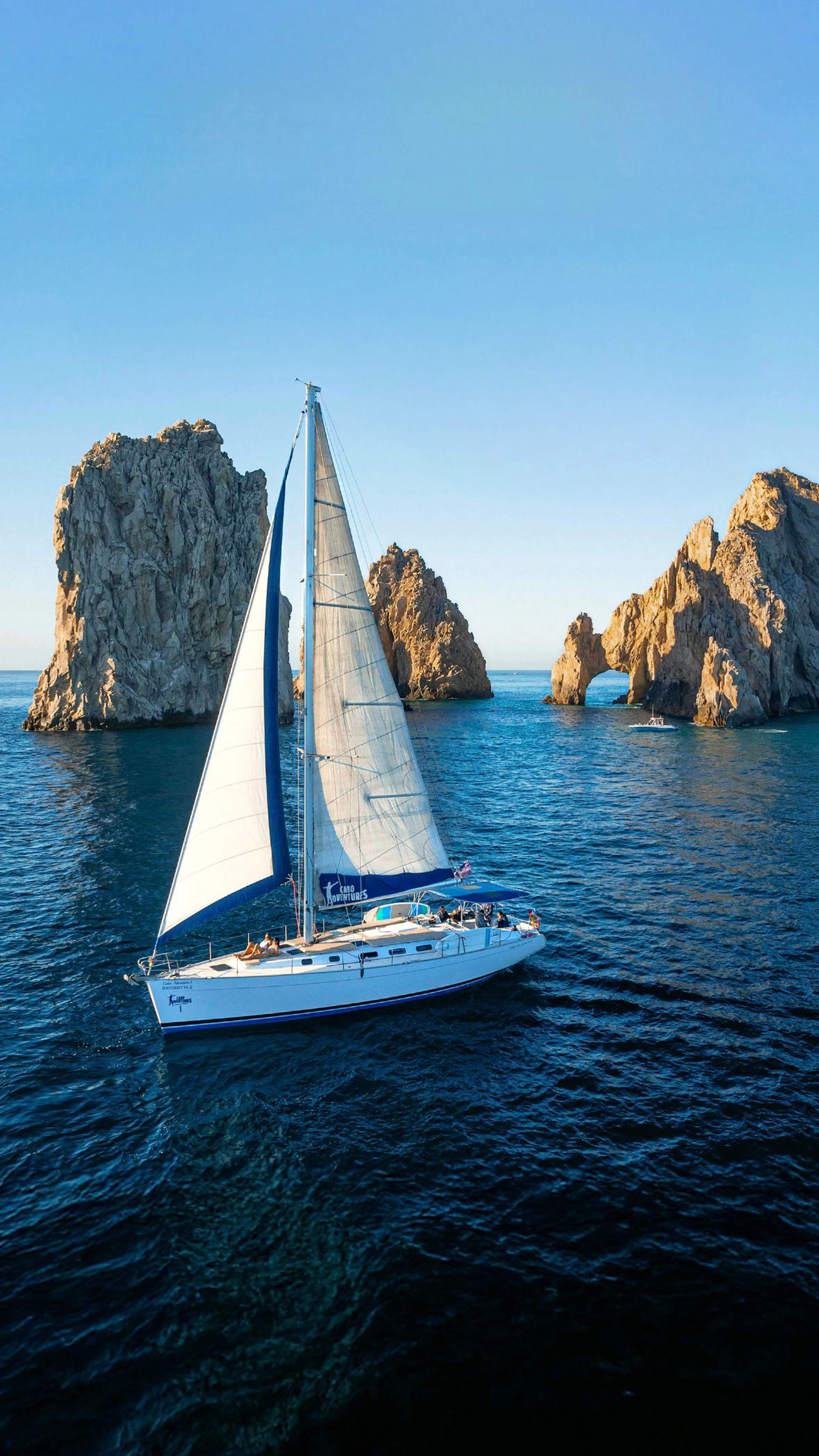Experience luxury with private yacht rentals in Cabo, sailing through the sparkling, crystal-clear waters.