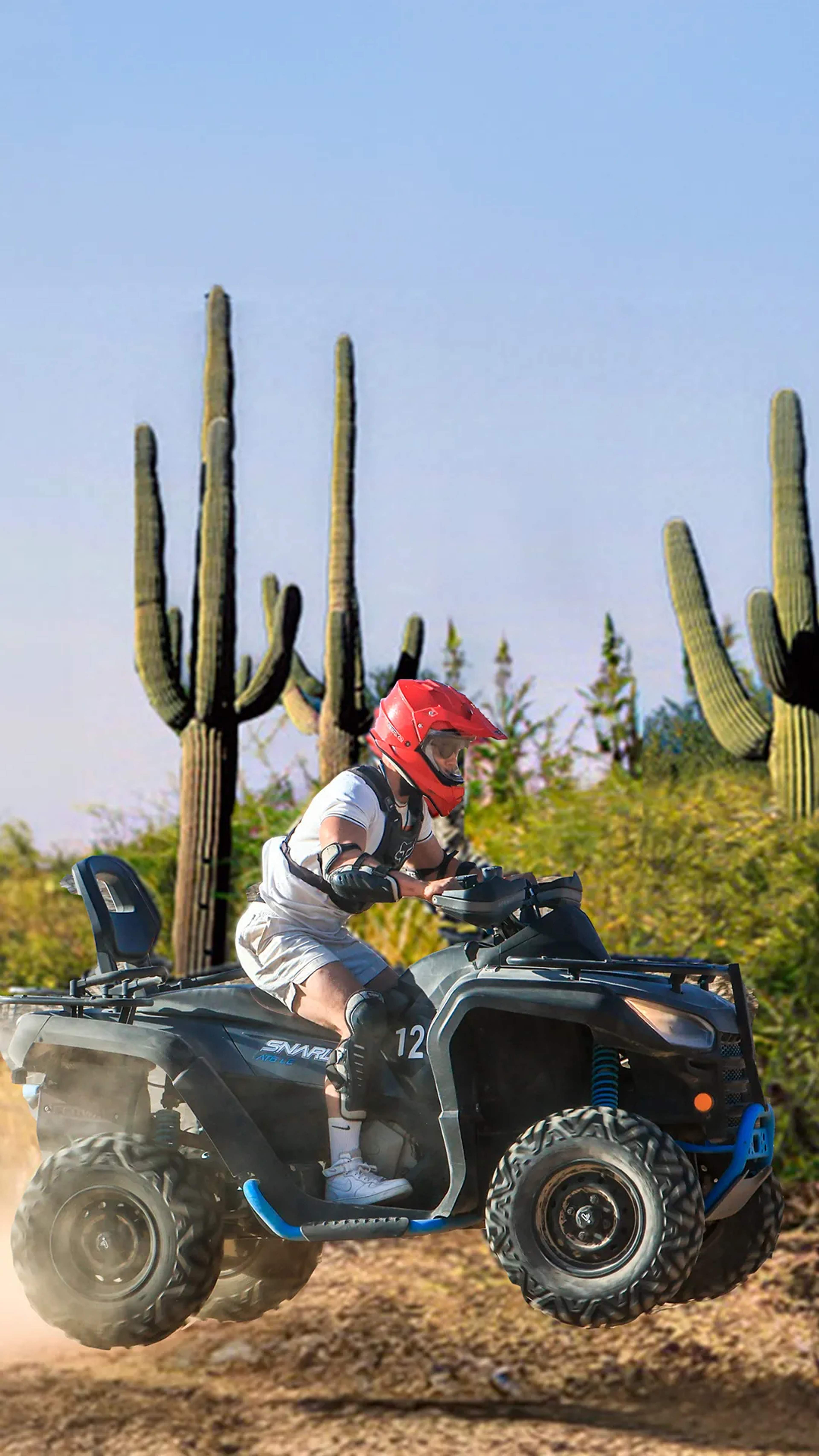ATV adventure in the desert of Los Cabos with Cabo Adventures, riding through cactus trails and dusty terrain