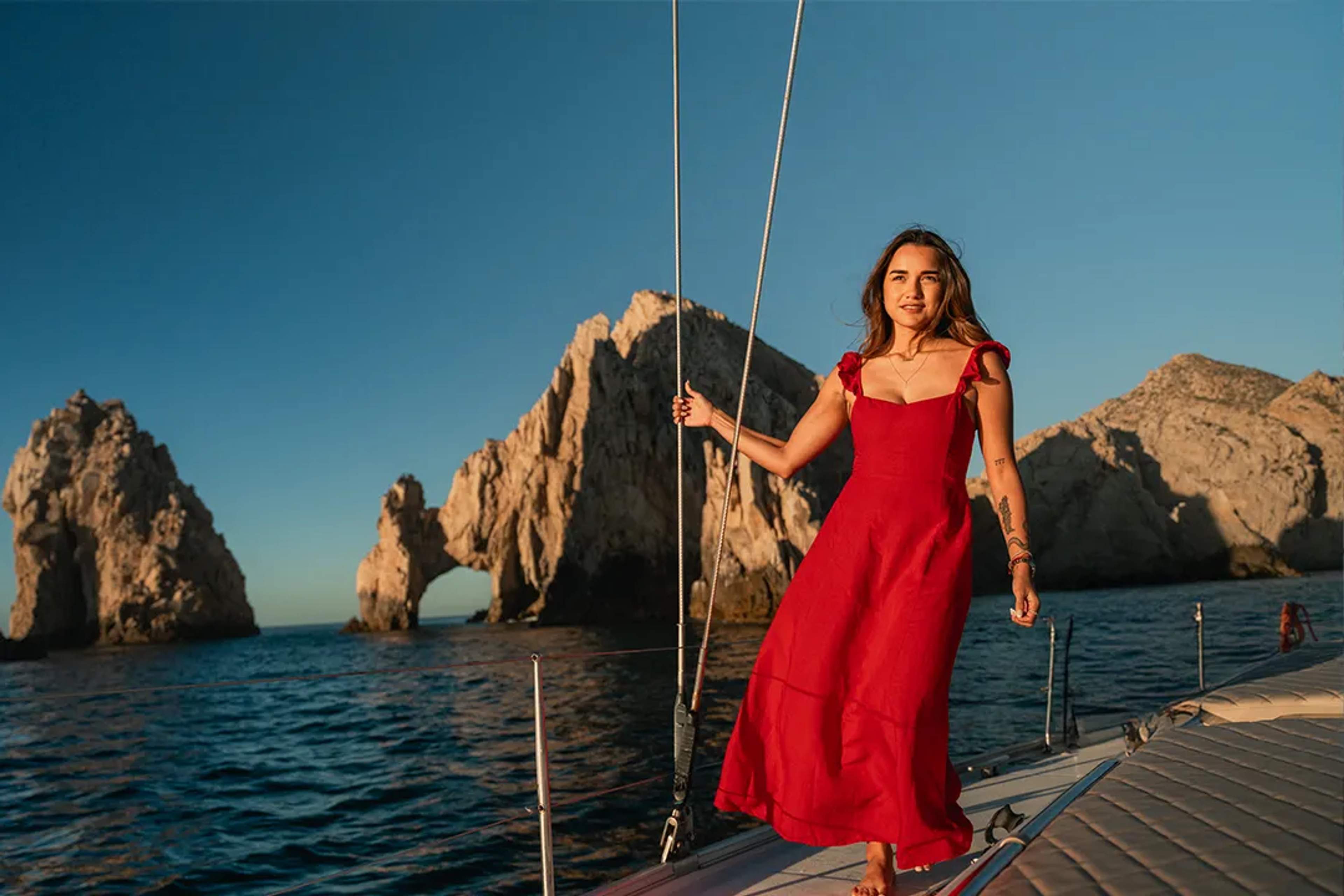 Luxury sailing in Los Cabos at sunset with Arch of Cabo San Lucas and scenic coastline experience