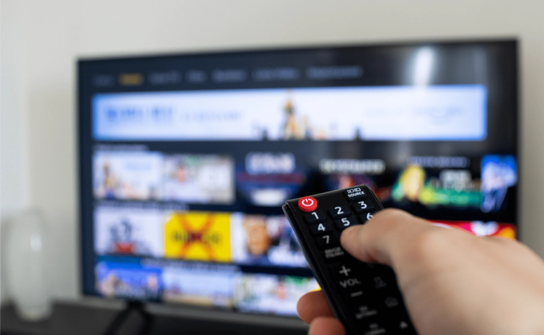 remote pointing to tv screen