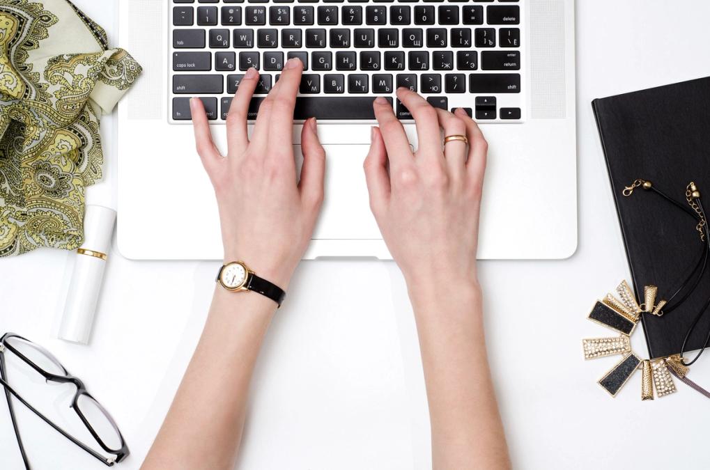 Person typing on laptop