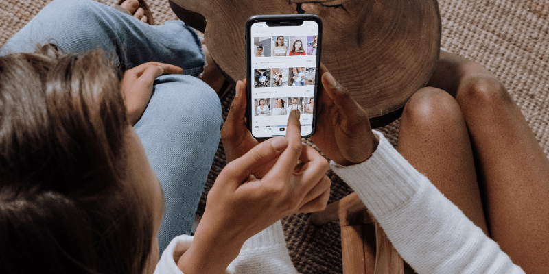 People scrolling on phone - social media app