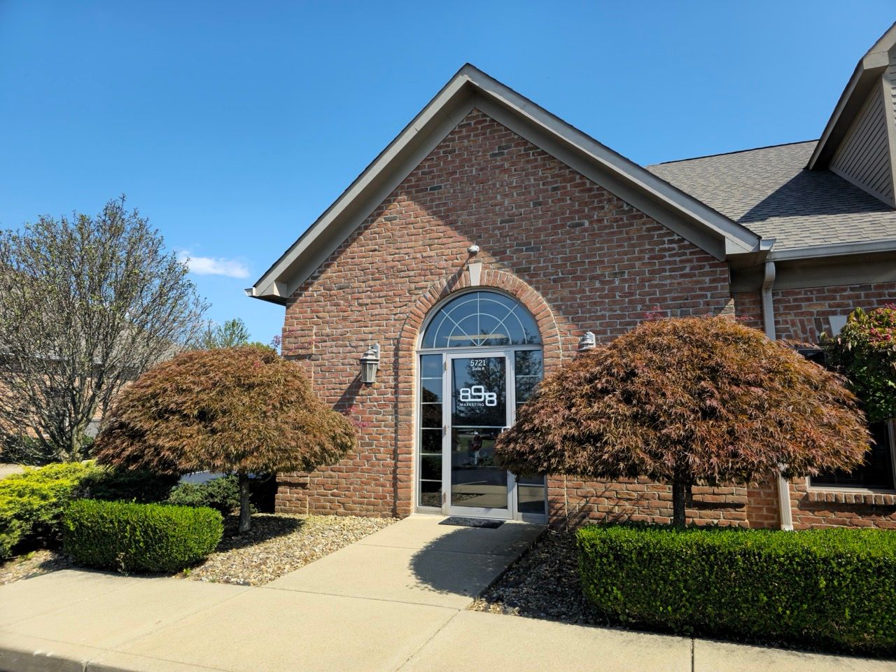 Brick building that operates as the Canfield 898 Marketing office
