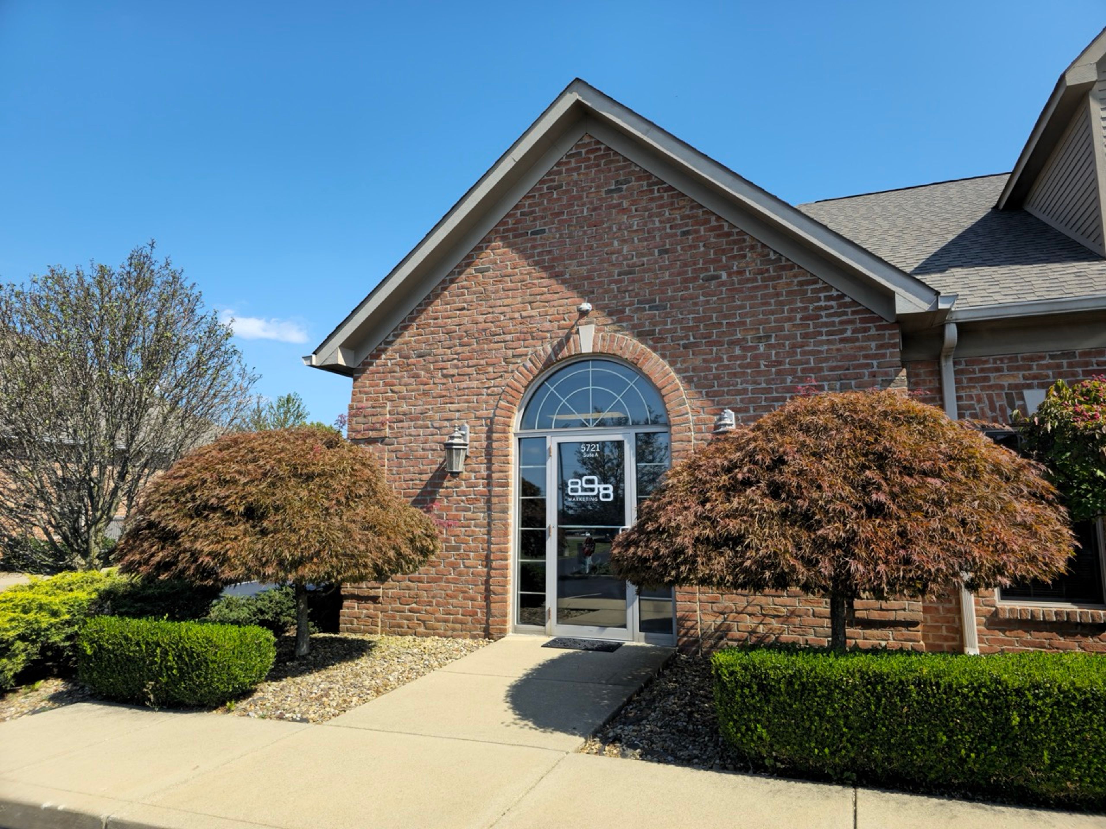 Brick building that operates as the Canfield 898 Marketing office