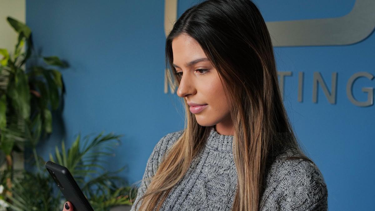 Girl looking and scrolling on phone