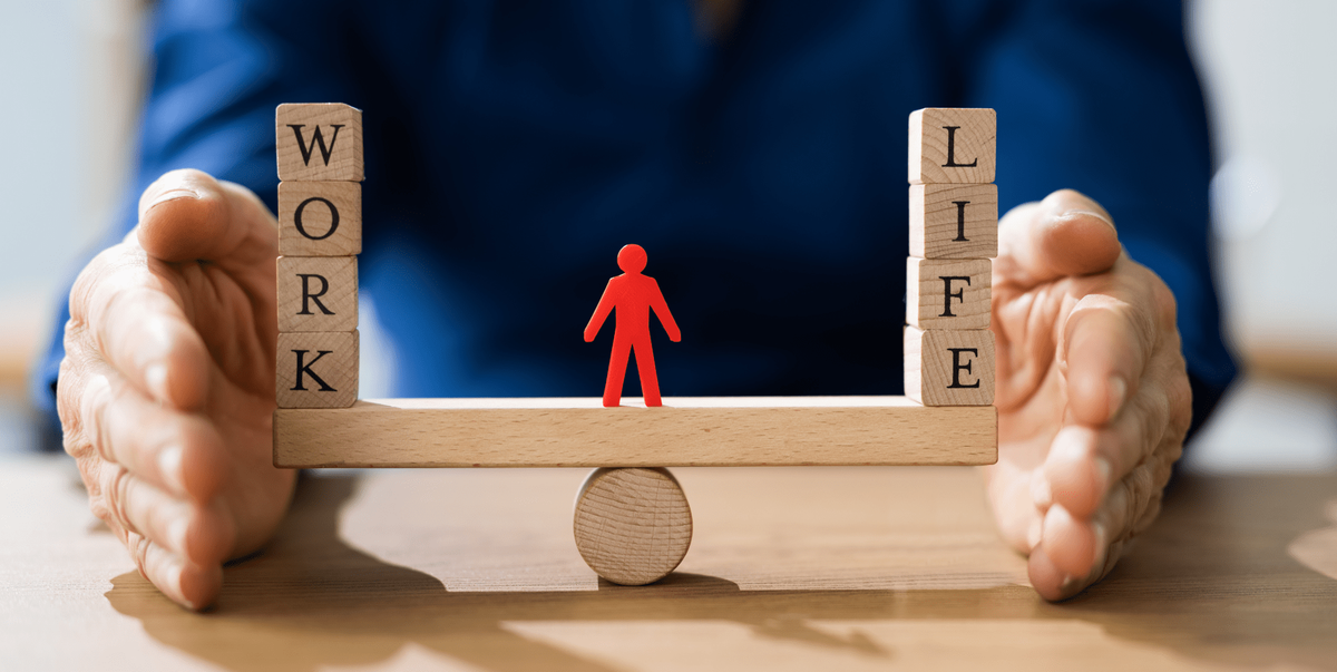 blocks with letters with red wooden figure in middle