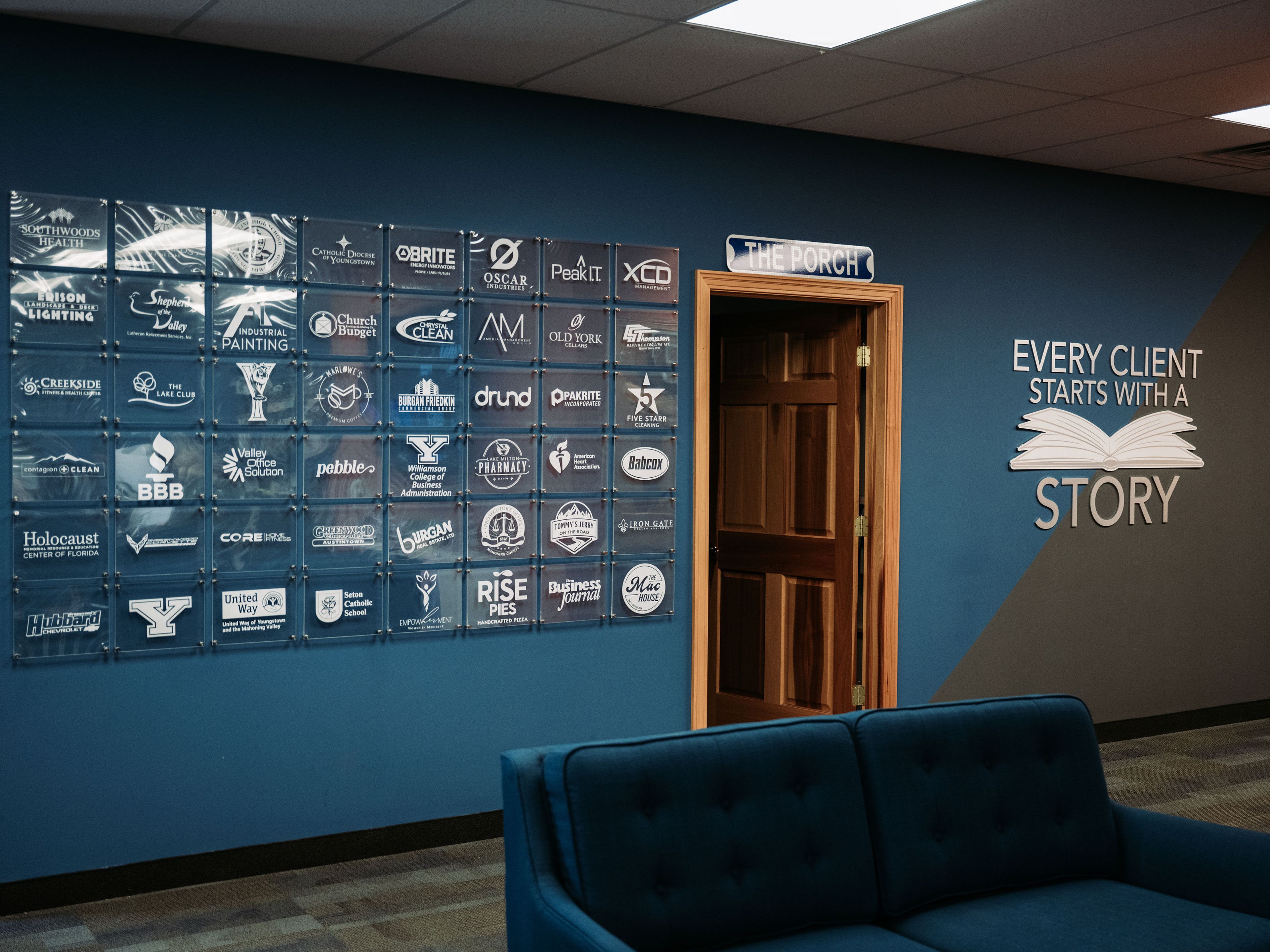 Partner plaque wall at the 898 Canfield office