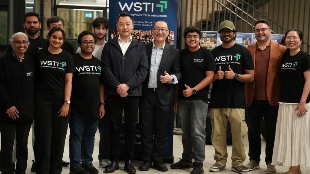 The WSTI team with guests at a community evening