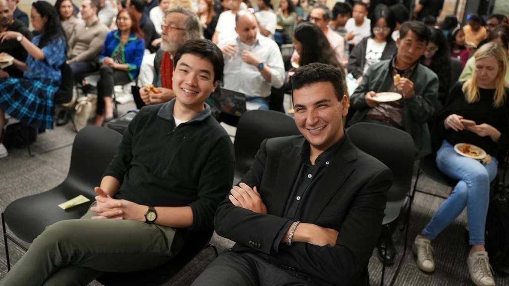 Two young builders in the audience