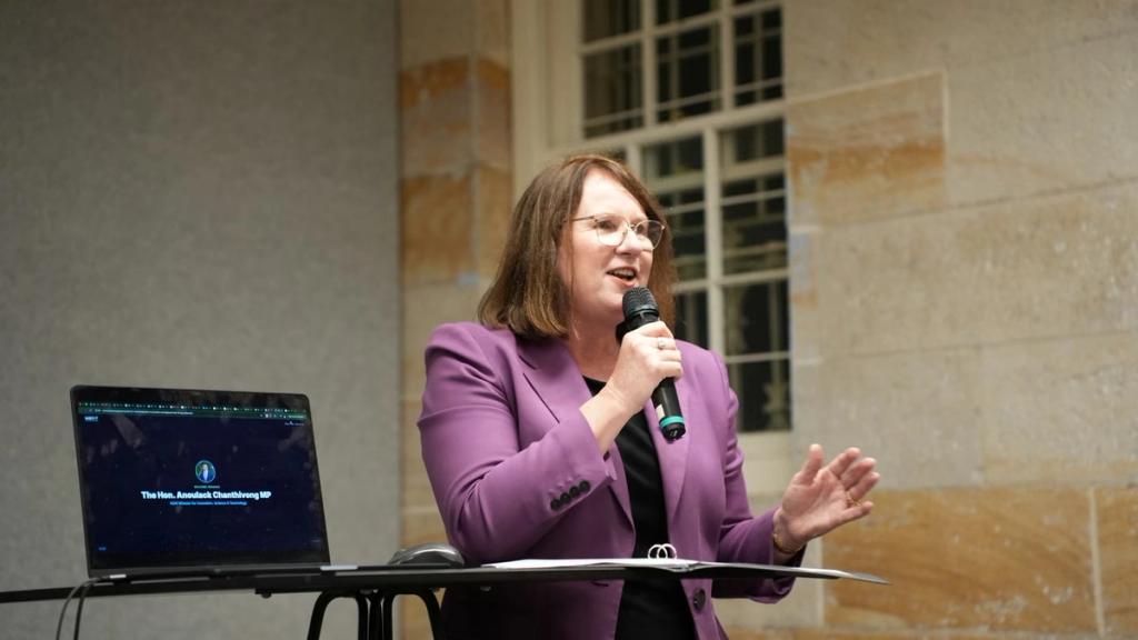 A guest speaker addresses the room