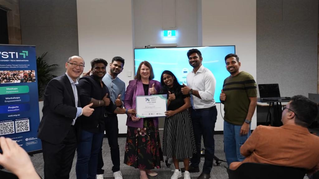 A participant receiving a certificate from the WSTI team.