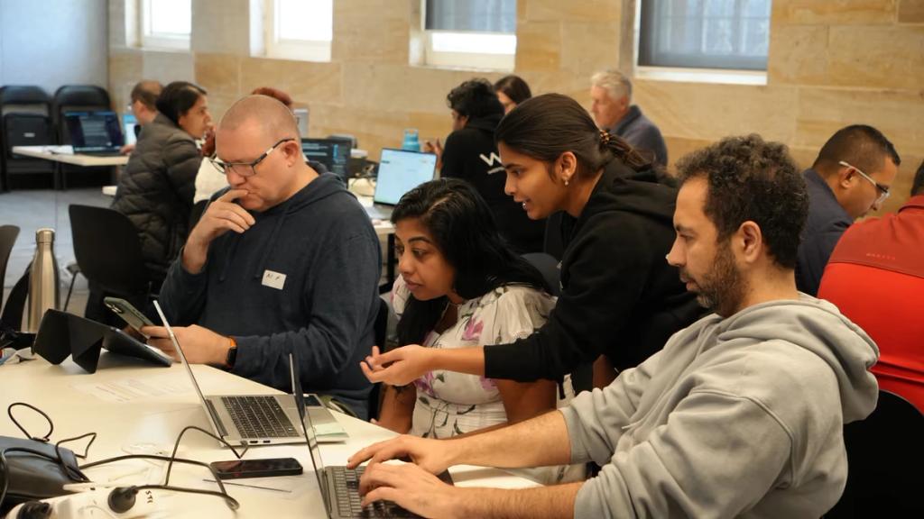 Participants practising on their own laptops.