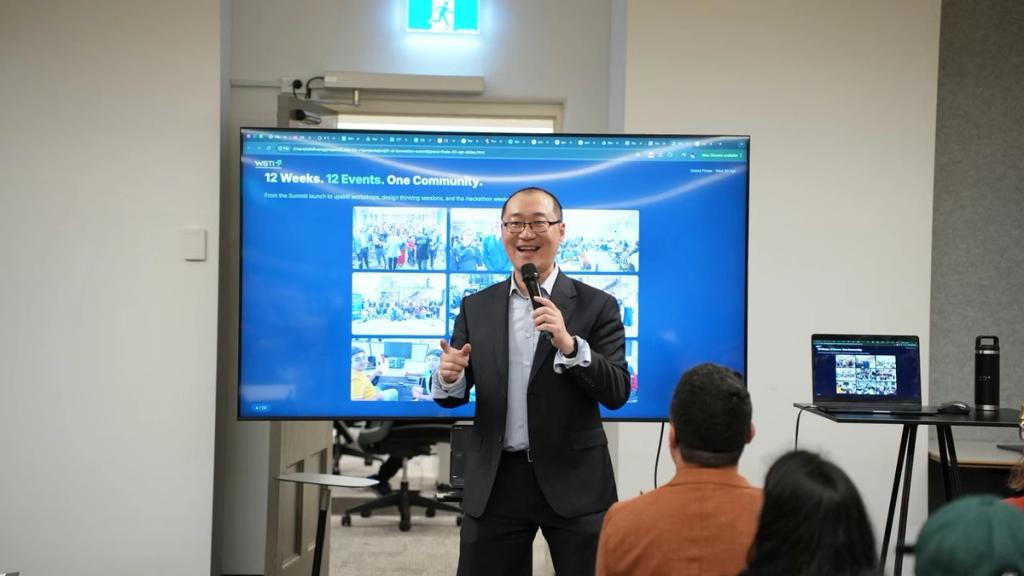 Lailei Huang presents at the screen