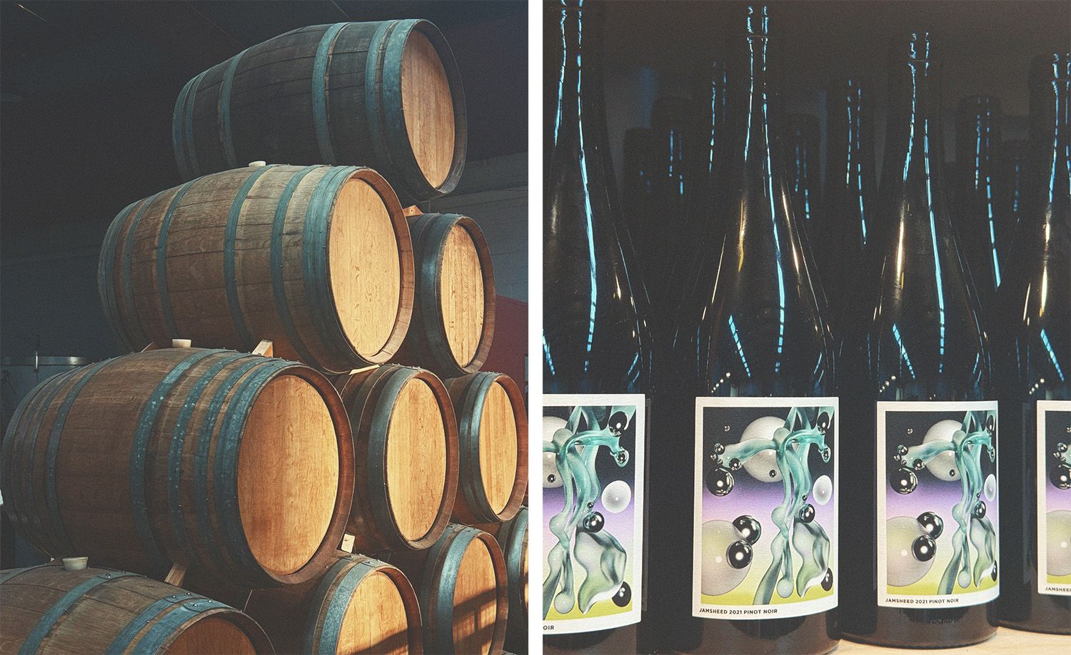 Two scenes from Jamsheed's urban winery in Thornbury: on the left, a dramatic stack of honey-toned oak barrels with dark steel hoops piled in a moody pyramid formation against a darkened winery interior; on the right, a row of dark glass Jamsheed 2021 Pinot Noir bottles bearing striking surrealist label artwork of fluid organic forms, metallic spheres and teal liquid against a lavender gradient, their elongated necks catching blue light in the darkness, capturing the creative ambition and artistic personality that sets this much-loved urban winery apart.