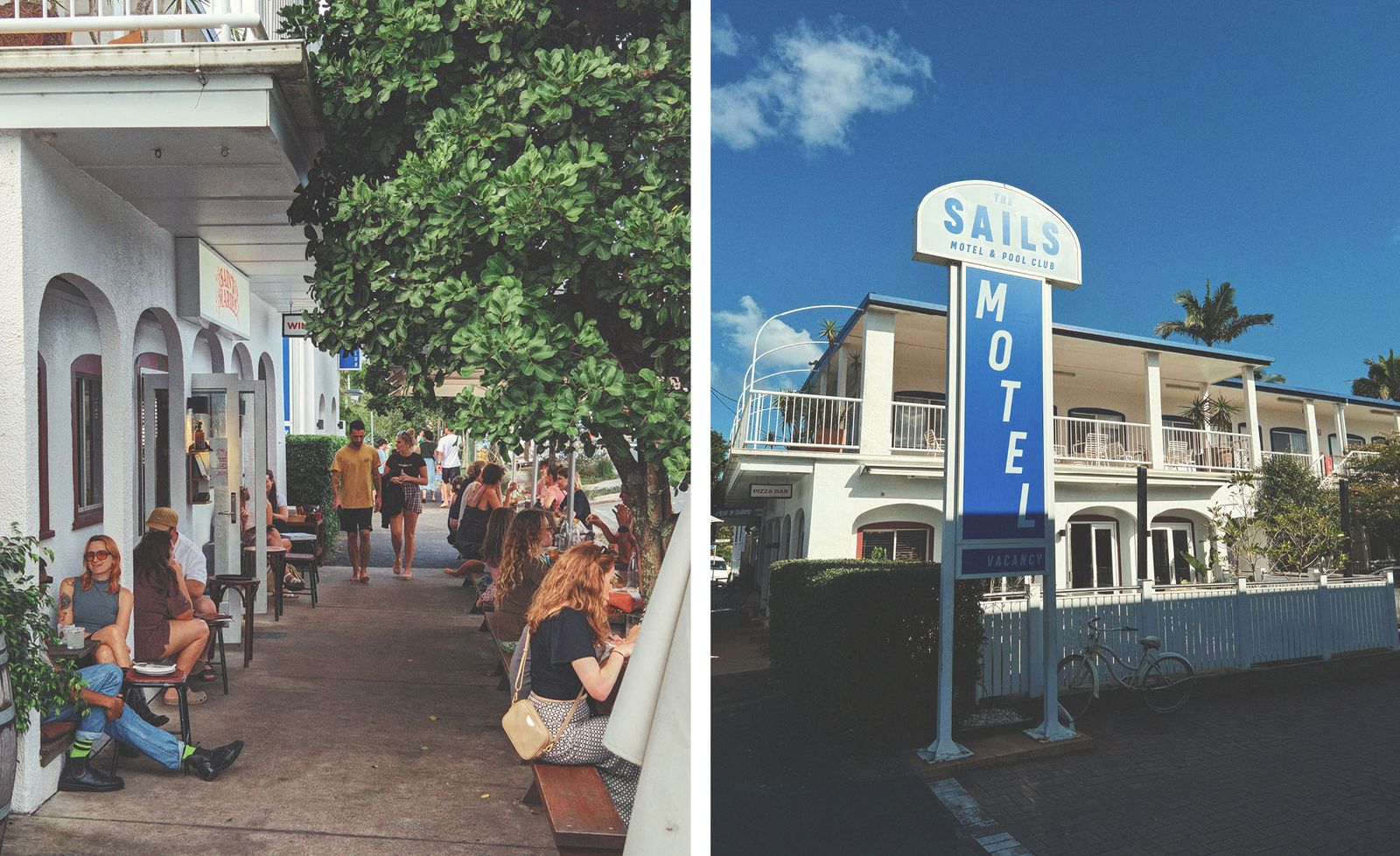 Two scenes from the same Brunswick Heads streetscape: on the left, a bustling footpath outside Saint Maries lined with diners at low timber benches beneath a canopy of lush green fig trees framing the white rendered arched facade, barefoot locals and visitors strolling the laneway behind; on the right, the Sails Motel and Pool Club signage in bold cobalt blue rising beside the white two-storey rendered building with wraparound first-floor balcony, tropical palms and a vintage bicycle completing the quintessential northern New South Wales coastal town scene beneath a vivid blue sky.