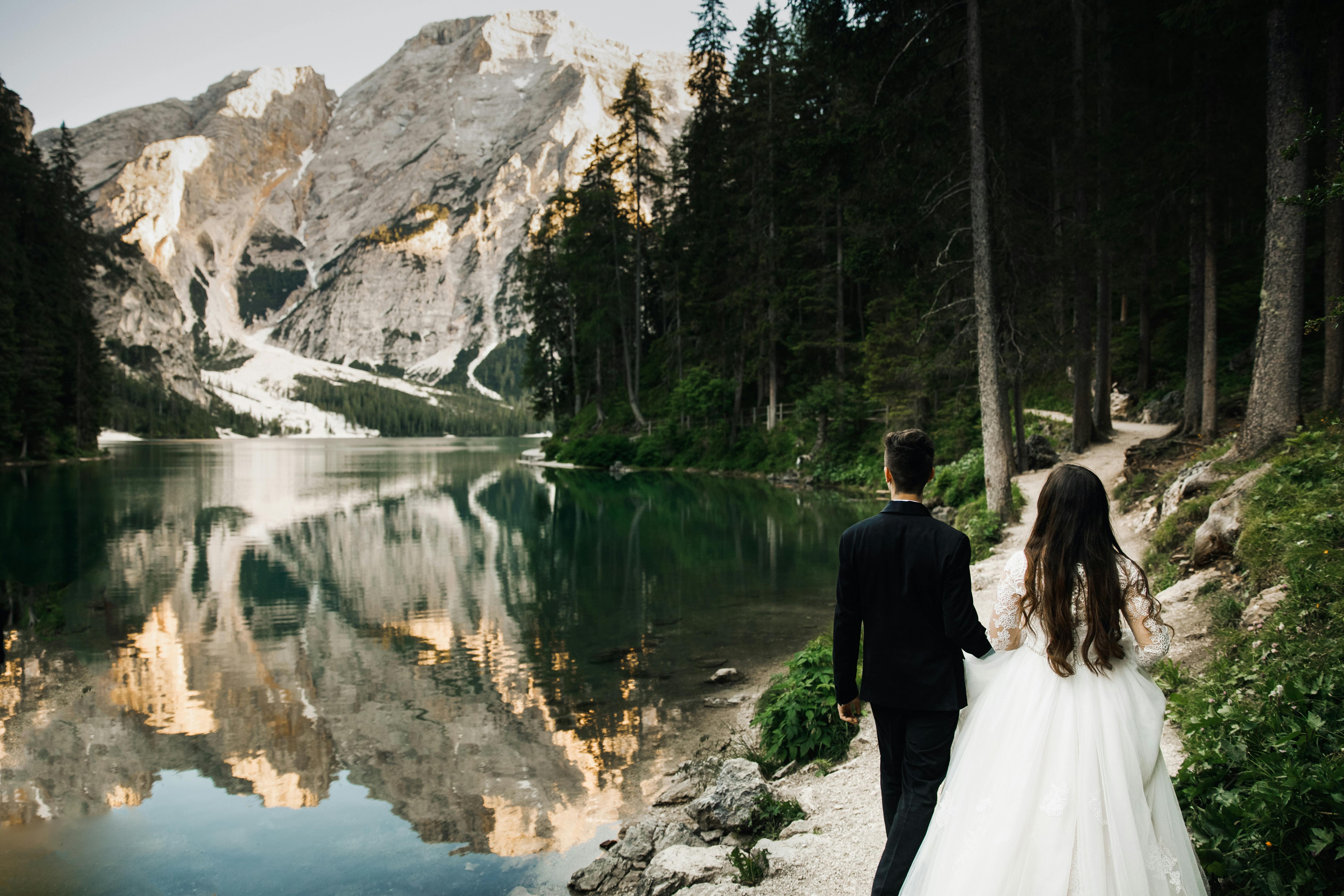 wedding couple wandering mountains