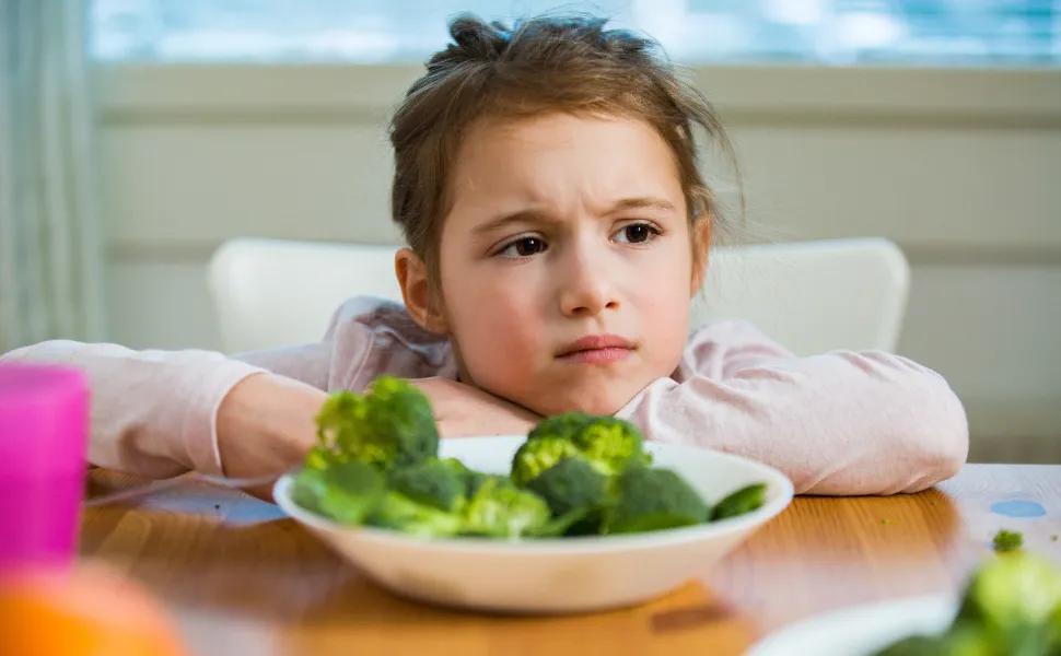 Child fed up with being forced to eat vegetables