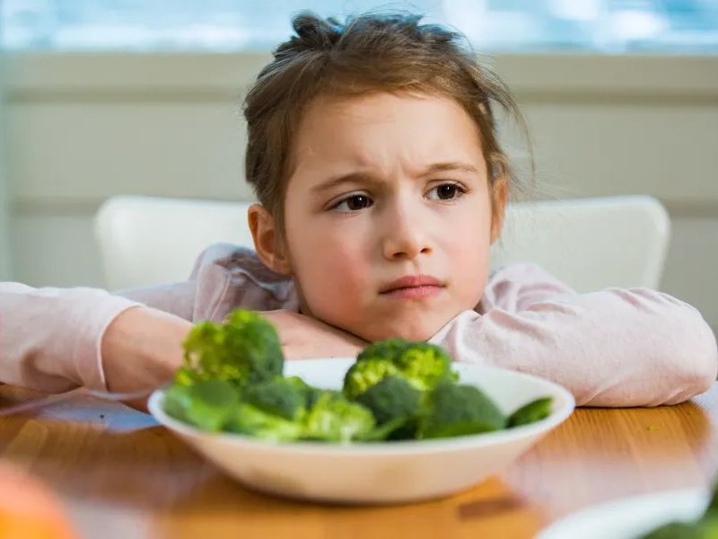 Child fed up with being forced to eat vegetables