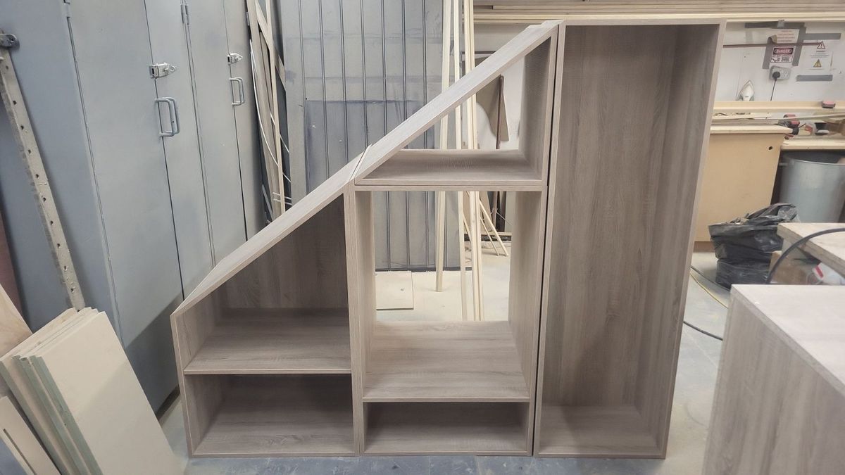 An under-stair storage unit being built in the Reilly workshop
