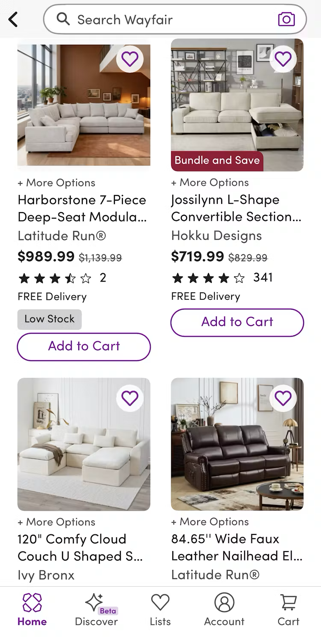 Wayfair mobile app PLP showing sofas and couches, with one item showing a "Low Stock" badge