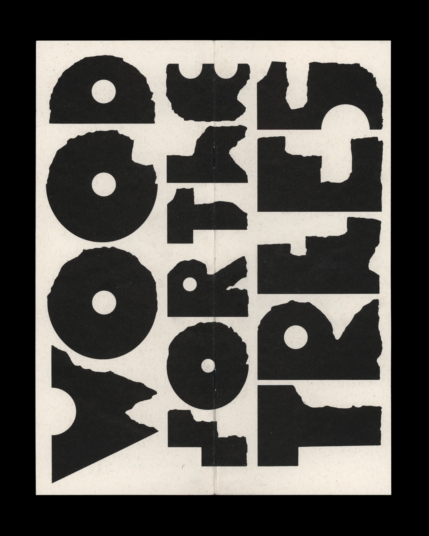 Bold black letters with rough, irregular edges on a white background, forming an abstract design.