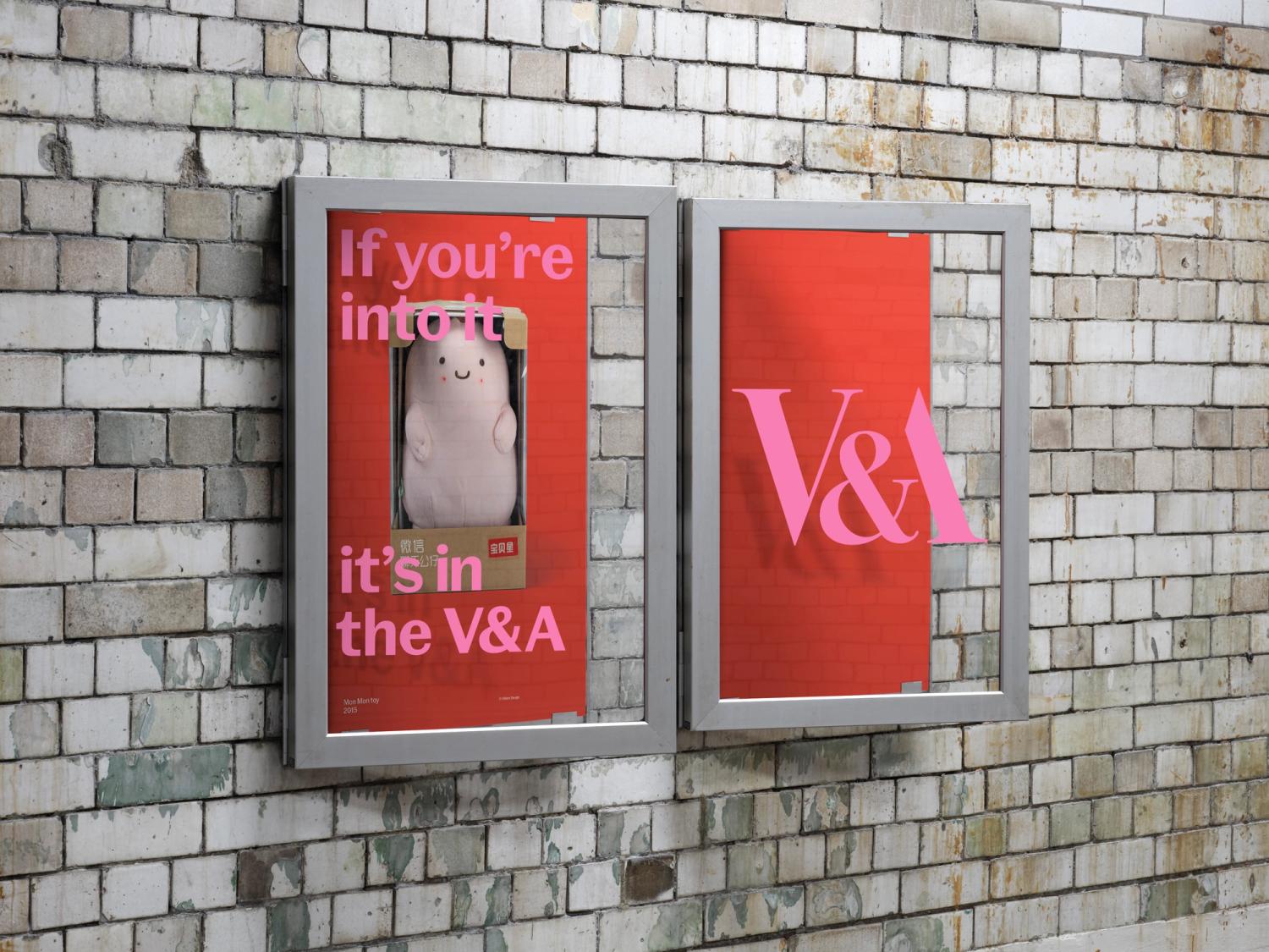 Two red posters in poster cases with the doors ajar and pink type stuck to the glass.