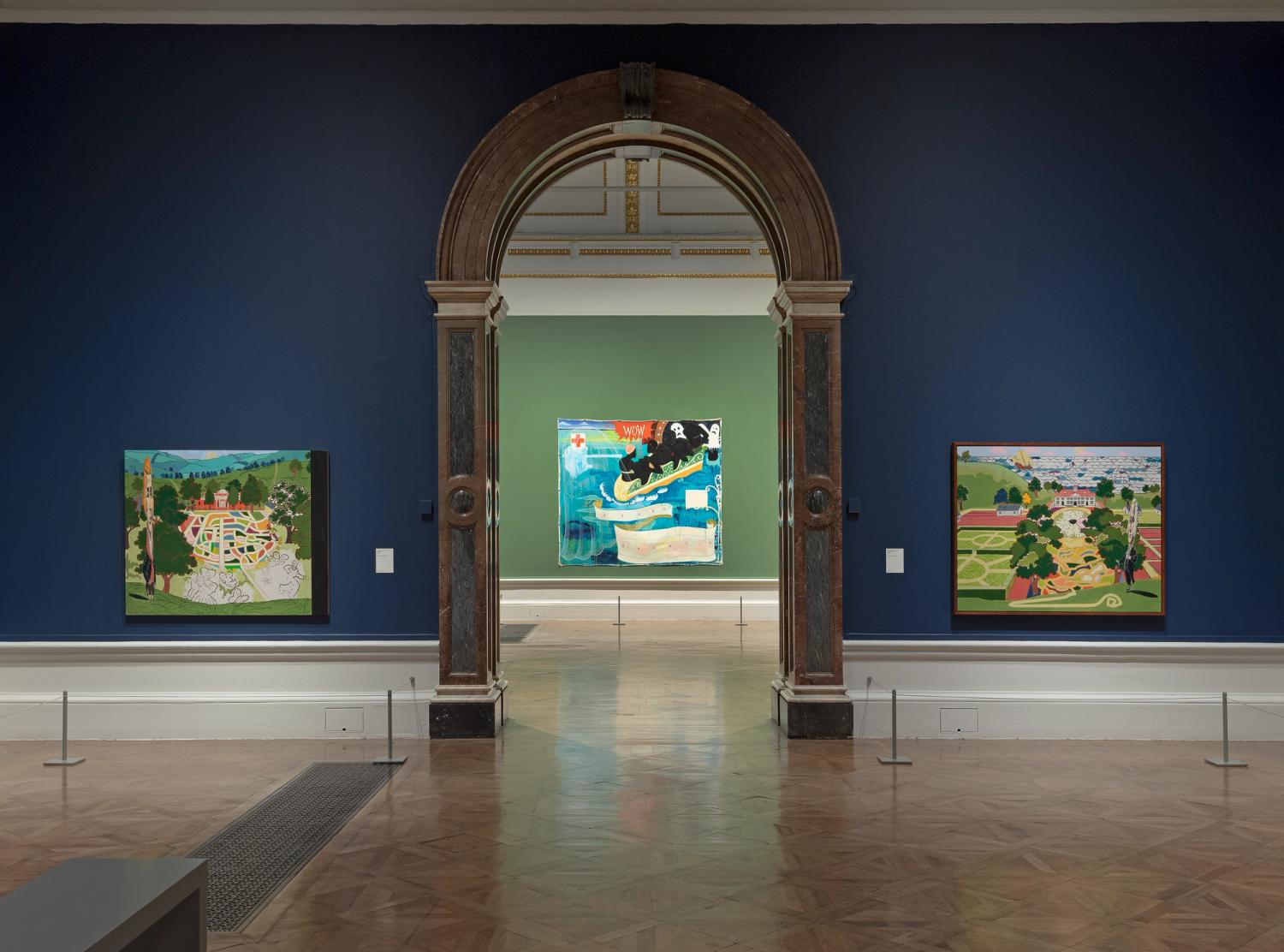 Two colourful artworks on blue walls, framing an arch leading to another vibrant painting on a green wall.
