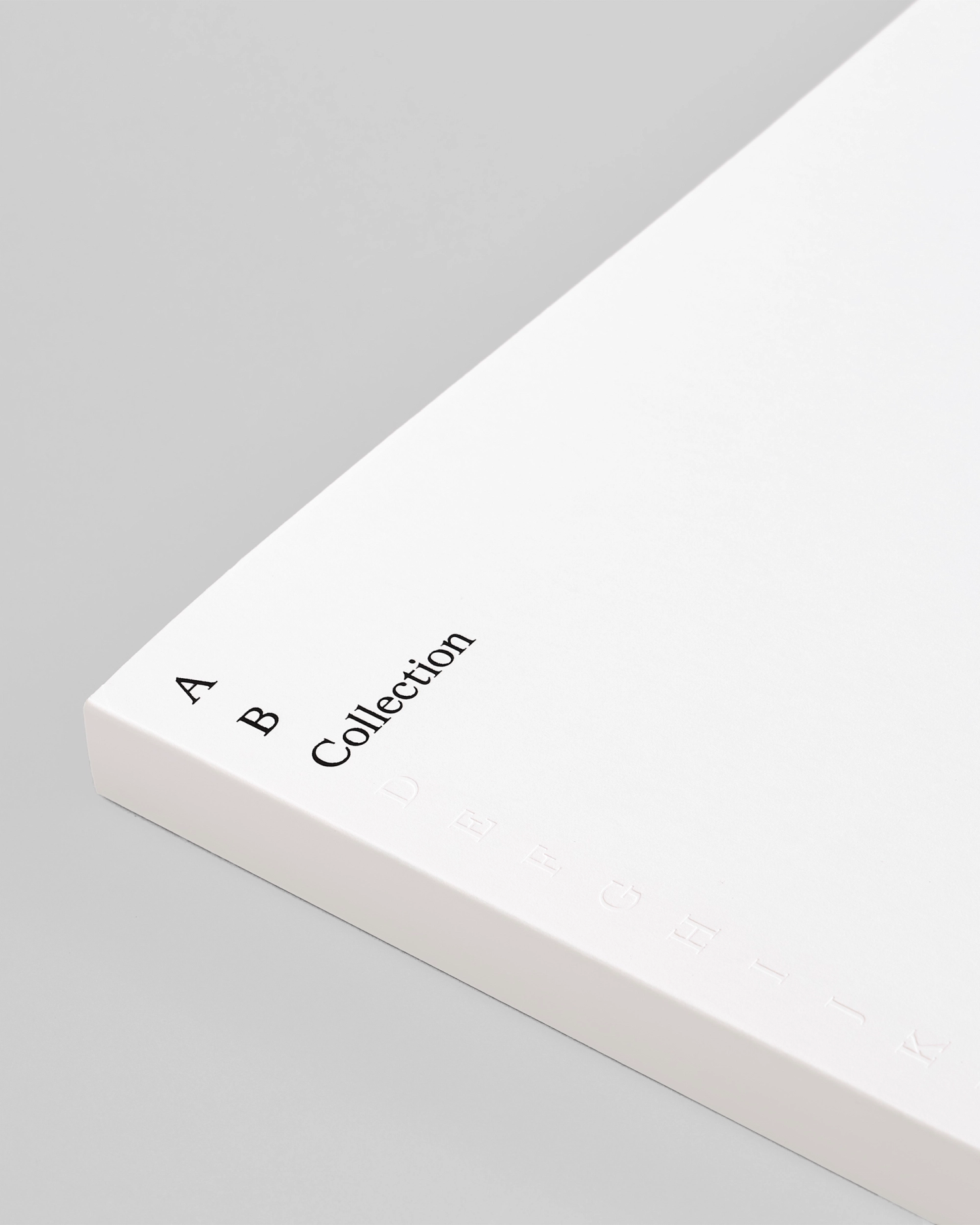 Photograph of the corner of a book with type reading 'A B Collection'