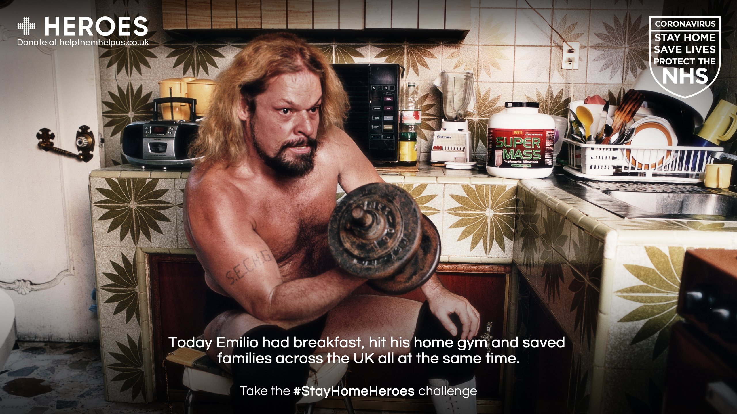 Long-haired man curling dumbbell in retro kitchen for Stay Home Heroes lockdown campaign