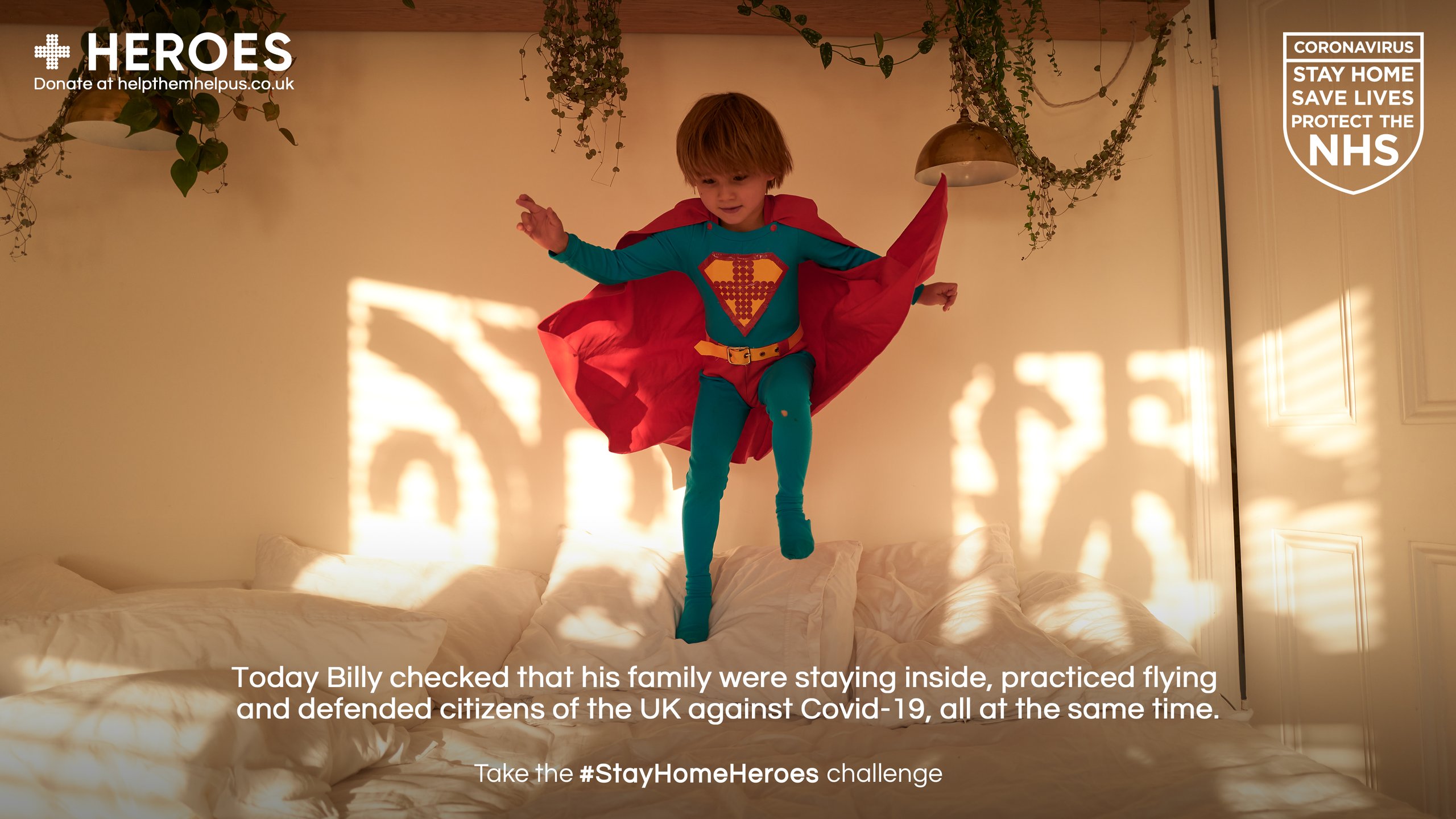 Boy in superhero costume jumping on bed for NHS Stay Home Heroes lockdown campaign