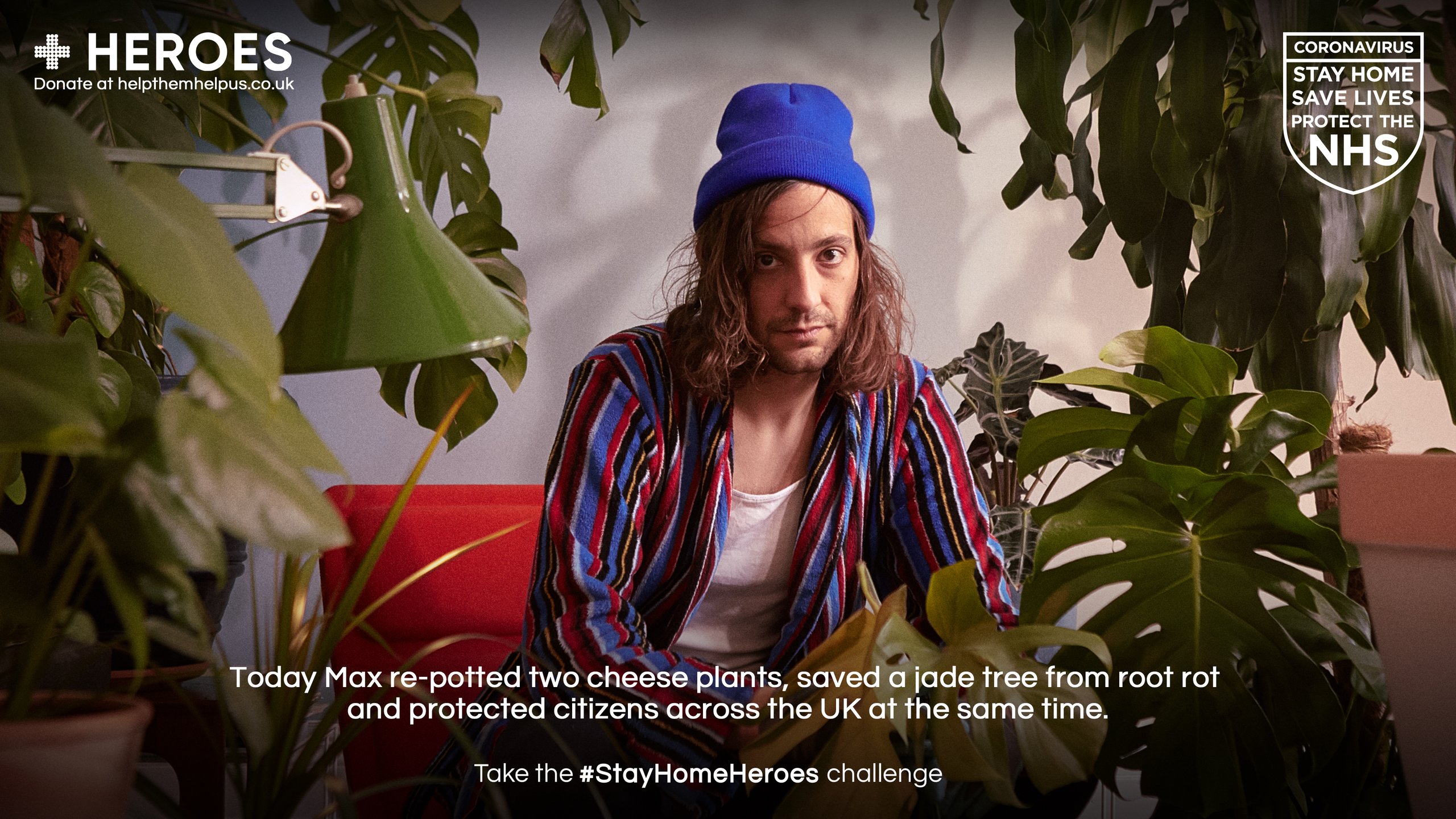 Man in blue beanie and striped cardigan surrounded by houseplants for Stay Home Heroes campaign