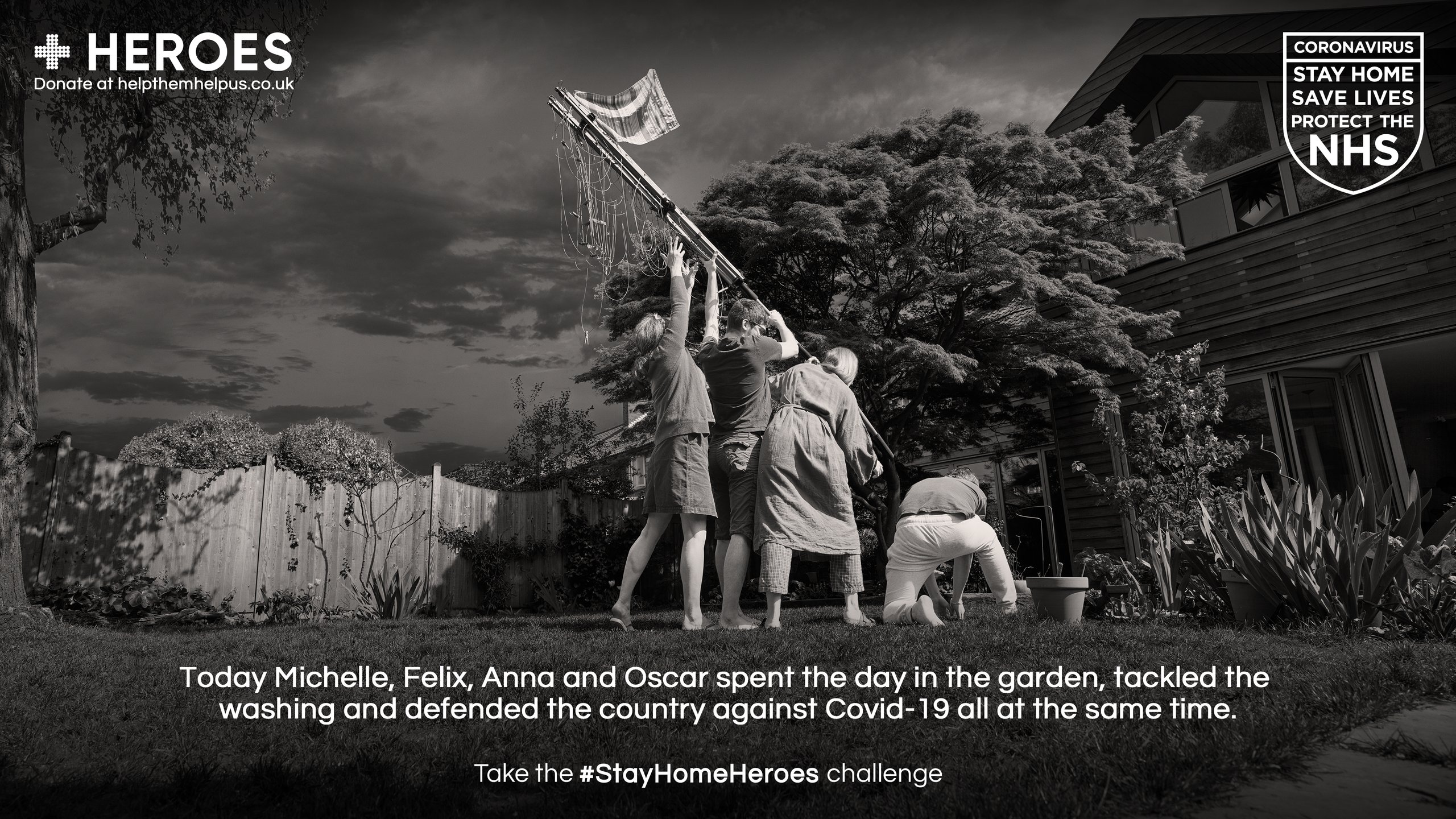Black and white image of family hanging washing in garden for Stay Home Heroes campaign
