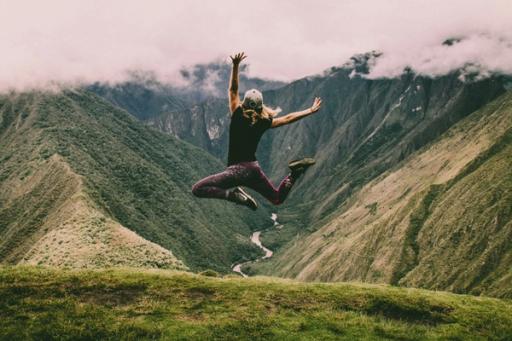 woman jumping - Active Calories vs Total Calories