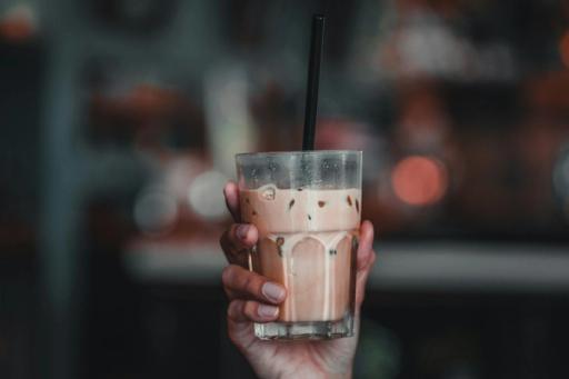 Person Holding glass - Can You Drink Protein Shakes While Intermittent Fasting