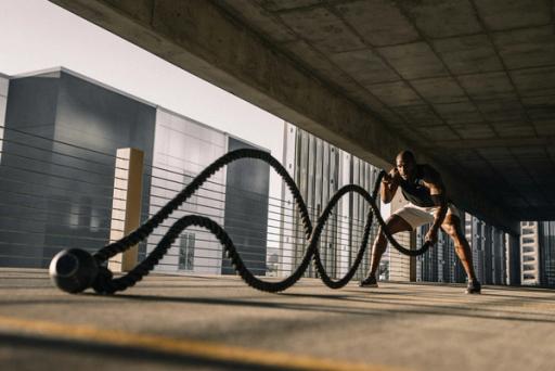 man working out - How Many Calories Should I Burn a Day?