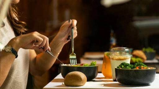 Person Eating  - Does Collagen Count Towards Protein Macros?