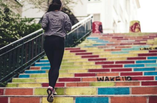 woman on stairs - Active vs Resting Calories