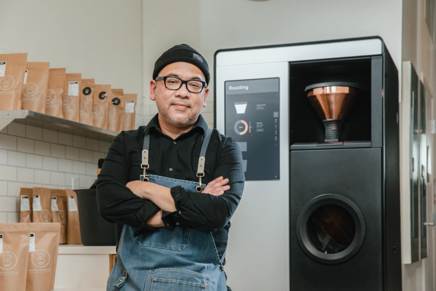 Professional café interior with coffee equipment and service counter