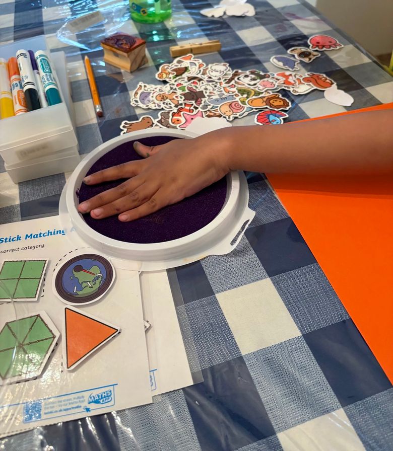 A child engaged in a learning activity