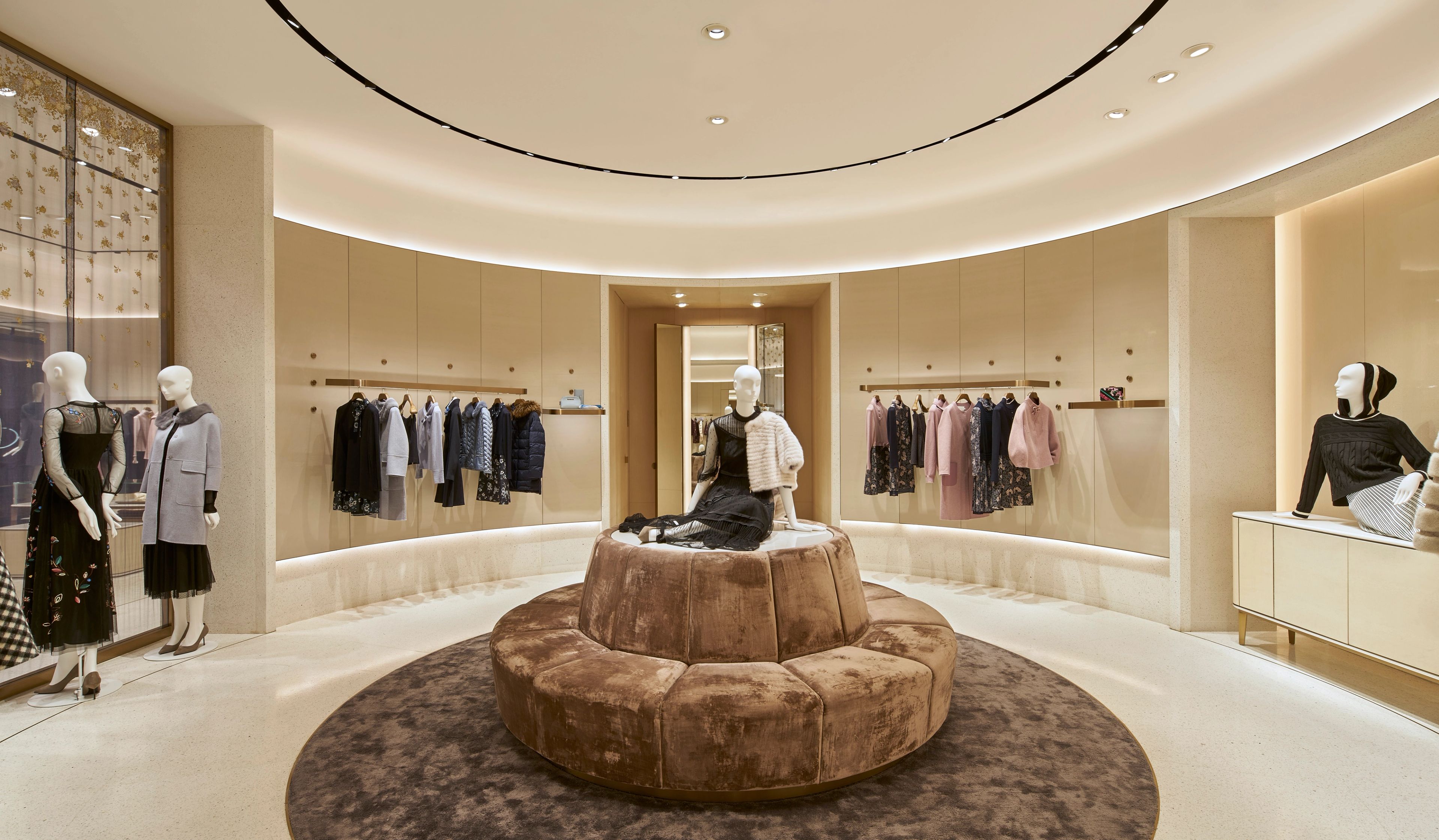 Luxury retail interior at the V Grass Nanjing Flagship Store with curated fashion displays, elegant furnishings and contemporary architecture.