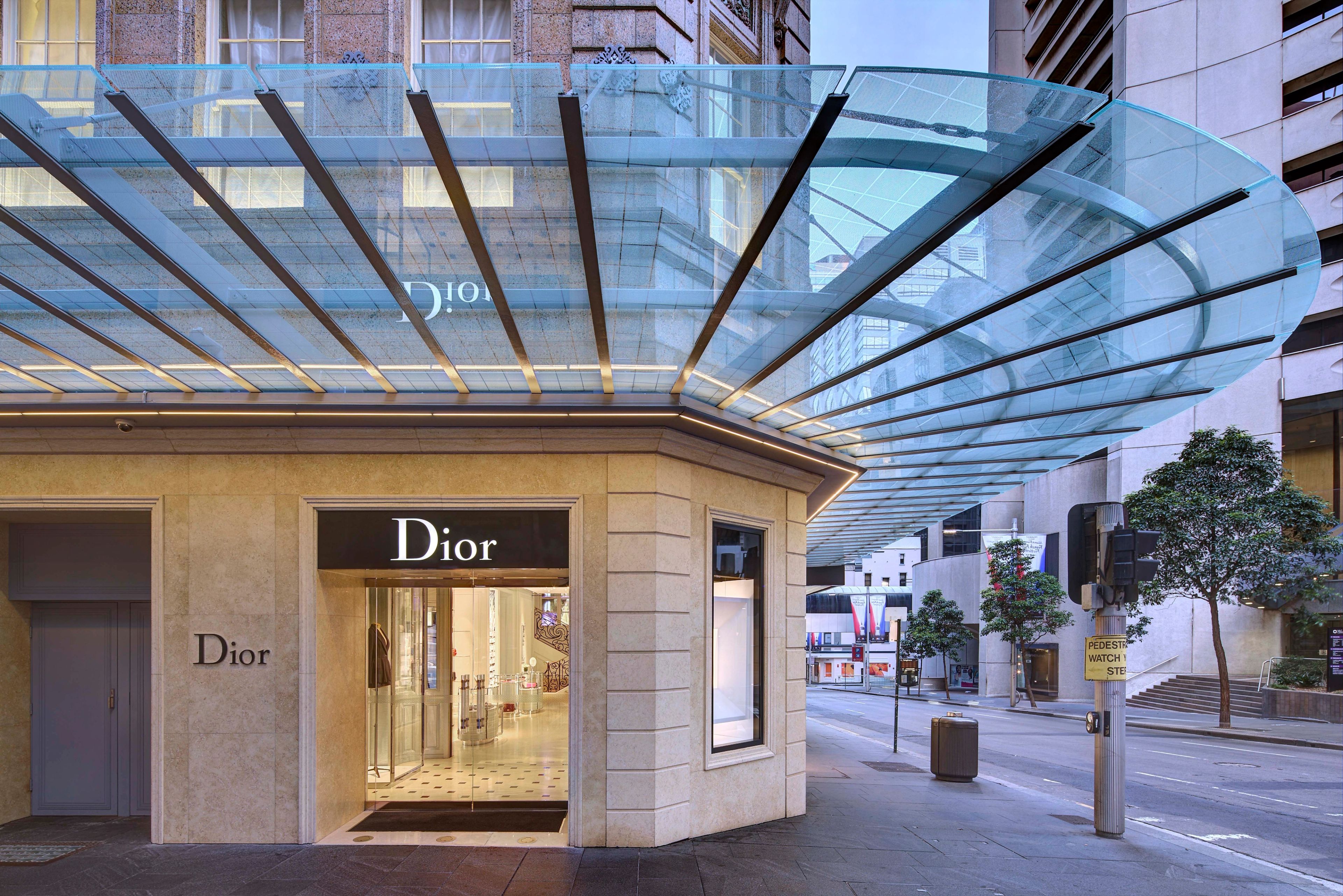 Dior Sydney flagship store featuring a contemporary glass awning sensitively integrated with the restored heritage building façade.